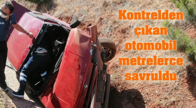 Su kanalına devrilen otomobildeki 2 kişi yaralandı