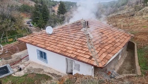 Ev yangını, ormana sıçramadan söndürüldü